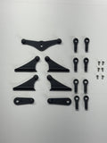 Set of black mechanical parts on a white background